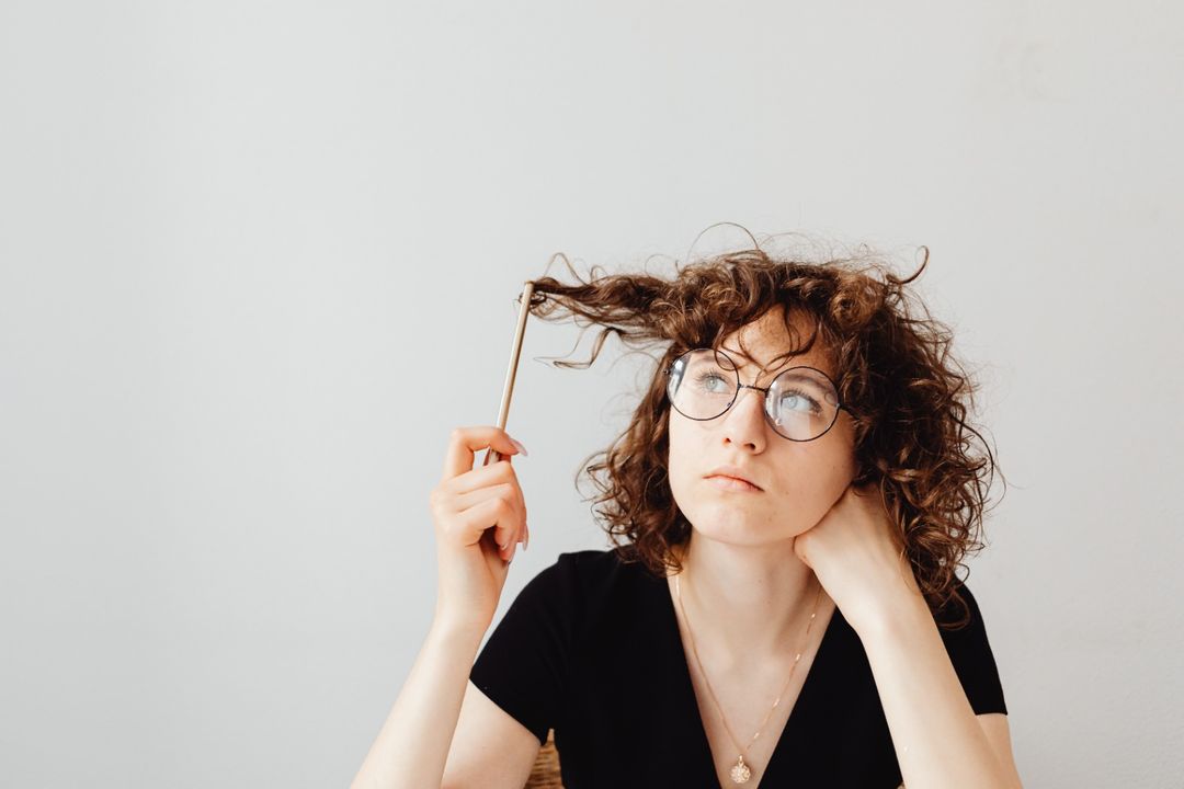 Photo by Karolina Grabowska: https://www.pexels.com/photo/woman-in-black-v-neck-shirt-wearing-eyeglasses-7681063/