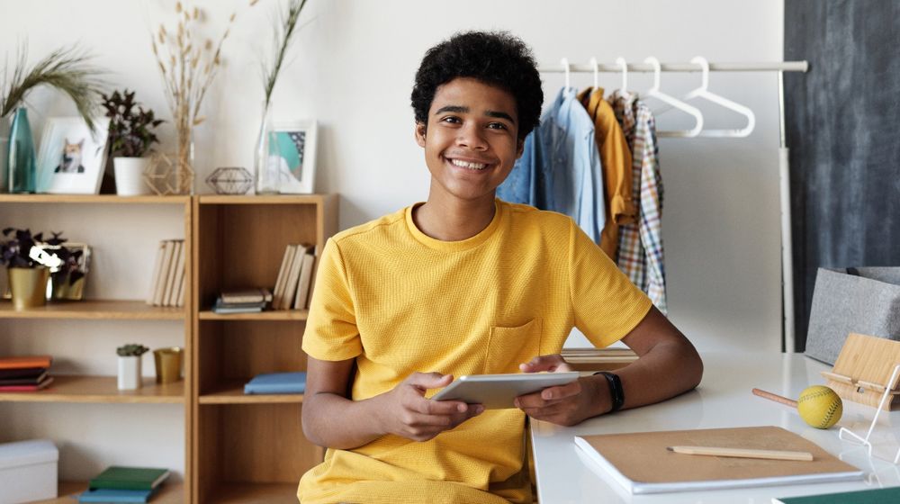 Photo by Julia M Cameron: https://www.pexels.com/photo/boy-in-yellow-crew-neck-t-shirt-sitting-on-chair-4144099/