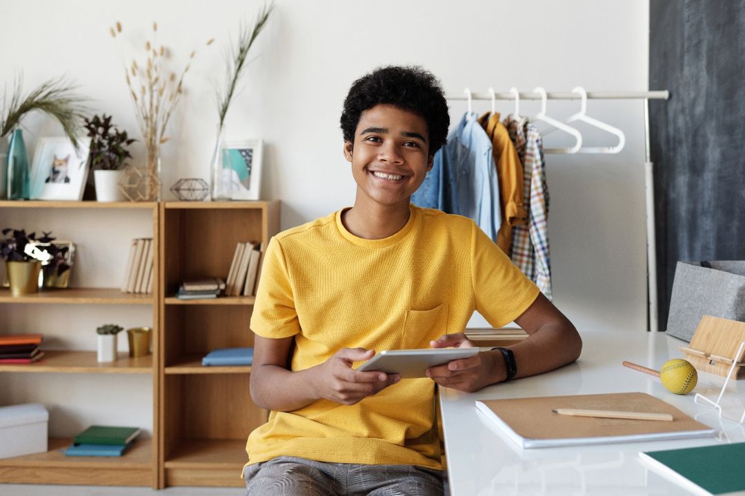 Photo by Julia M Cameron: https://www.pexels.com/photo/boy-in-yellow-crew-neck-t-shirt-sitting-on-chair-4144099/