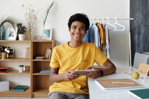 Photo by Julia M Cameron: https://www.pexels.com/photo/boy-in-yellow-crew-neck-t-shirt-sitting-on-chair-4144099/