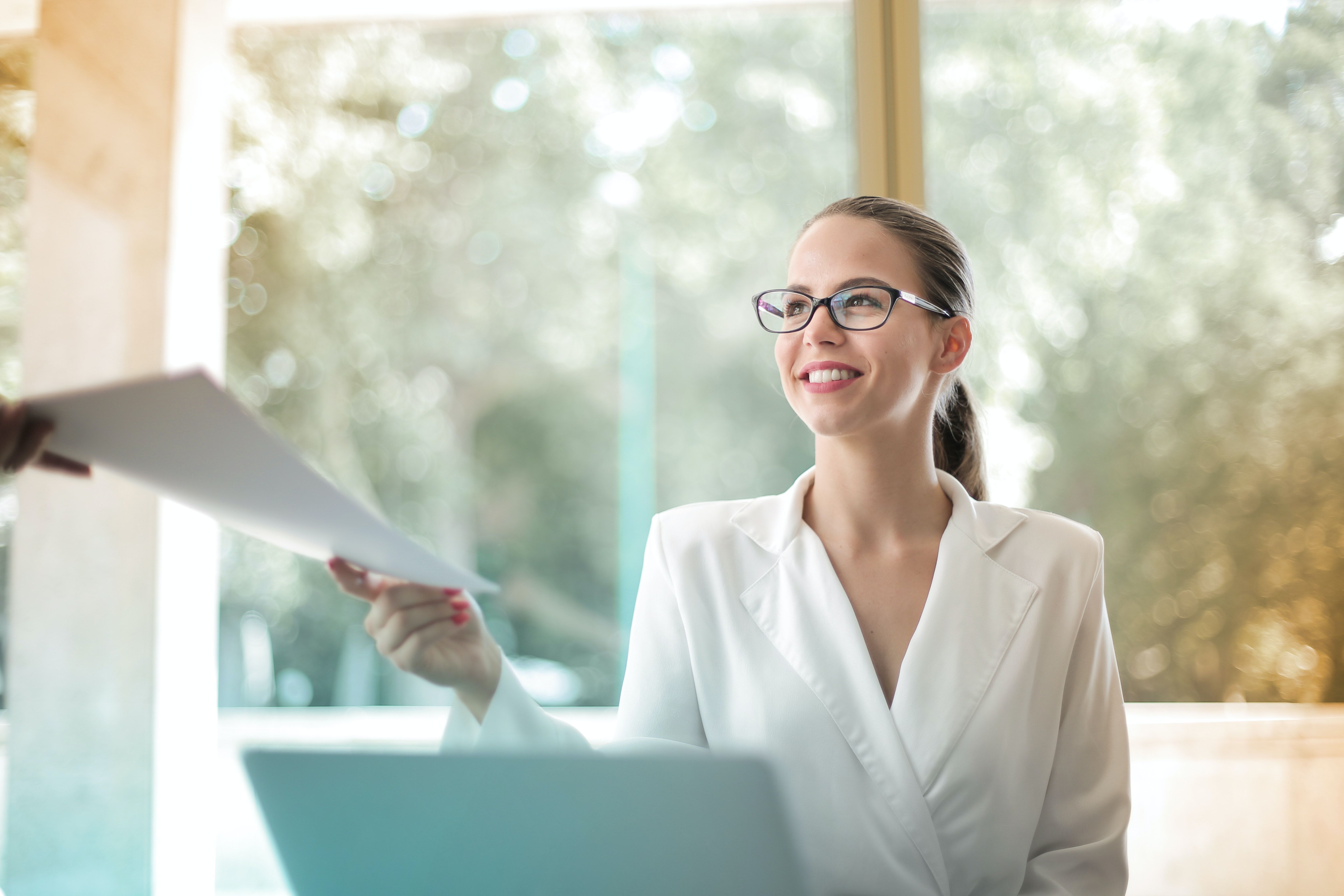 Photo by Andrea Piacquadio: https://www.pexels.com/photo/positive-businesswoman-doing-paperwork-in-office-3756678/