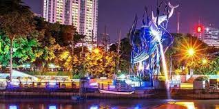 Kota Surabaya di malam hari.  PMA di  kota ini sangat besar.