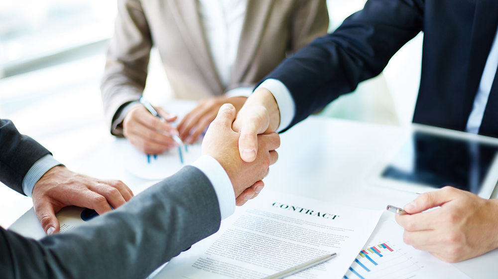 handshake-close-up-executives.jpg