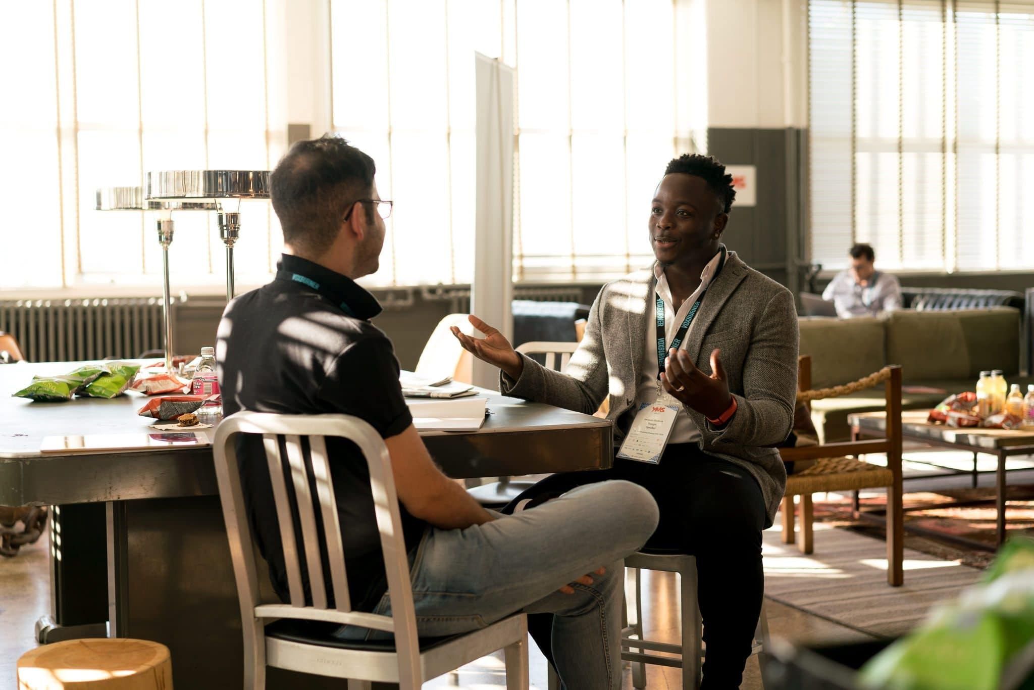 Photo by nappy: https://www.pexels.com/photo/photo-of-men-having-conversation-935949/