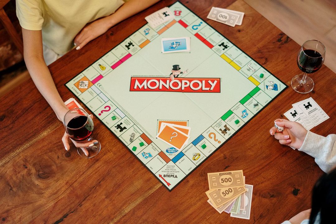 Photo by cottonbro studio: https://www.pexels.com/photo/monopoly-board-game-on-brown-wooden-table-4004426/