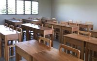 Bangku sekolah di Queen Victoria School usai direhabilitasi.