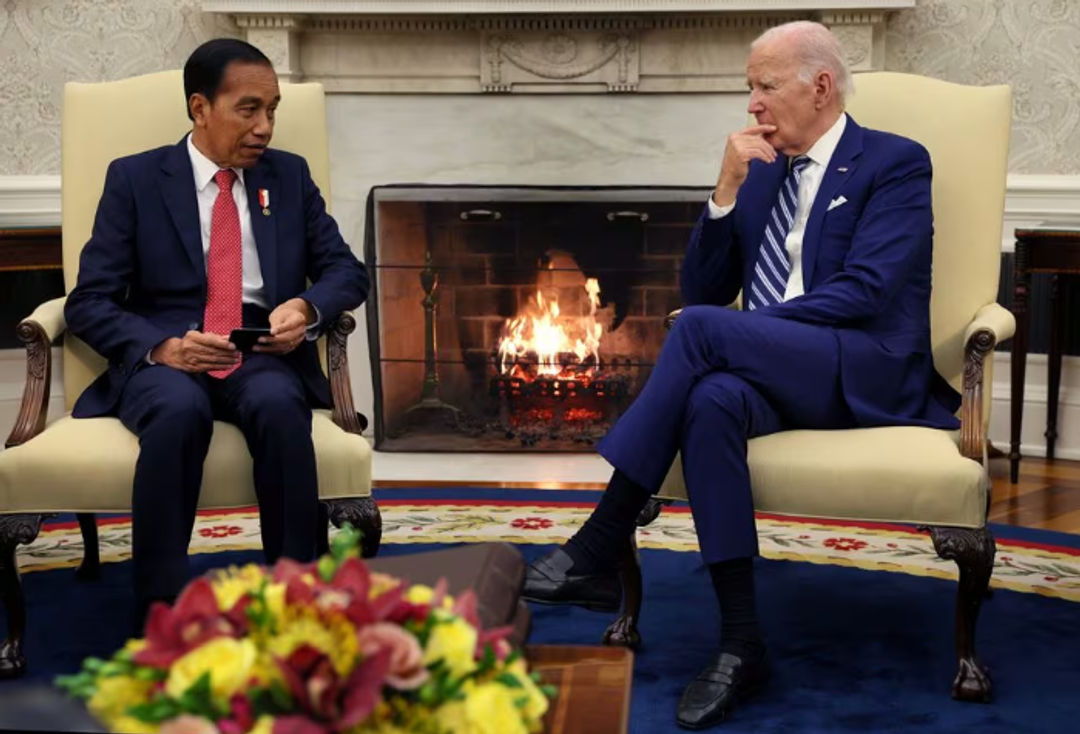 Presiden RI Joko Widodo dan Presiden AS Joe Biden (Reuters/Leah Millis)