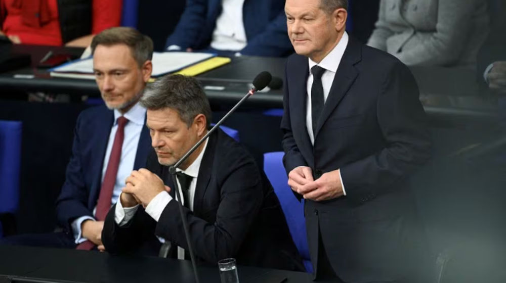 Kanselir Olaf Scholz Berbicara di Sebelah Menteri Keuangan Christian Lindner dan Menteri Ekonomi dan Menteri Iklim Robert Habeck dalam Sidang di Majelis Parlemen Jerman