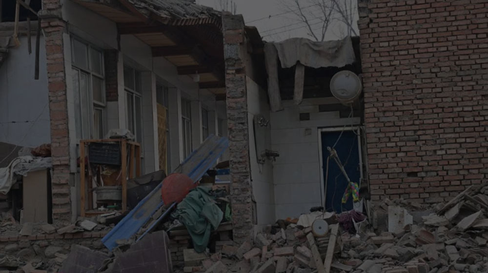 Pemandangan Puing-Puing dan Bangunan Rusak di Kota Dahejia Setelah Gempa di Kabupaten Jishishan