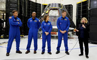 Astronot untuk misi Artemis II NASA berdiri di depan kapsul kru Orion mereka