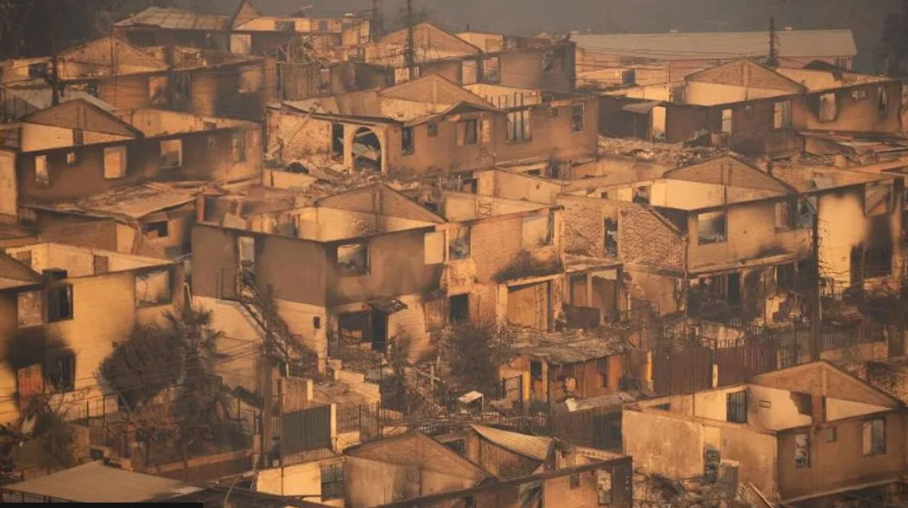 Di El Olivar, sebuah daerah di Vi delA del Mar (wilayah ValparaíSo) banyak rumah yang hangus akibat kebakaran hutan