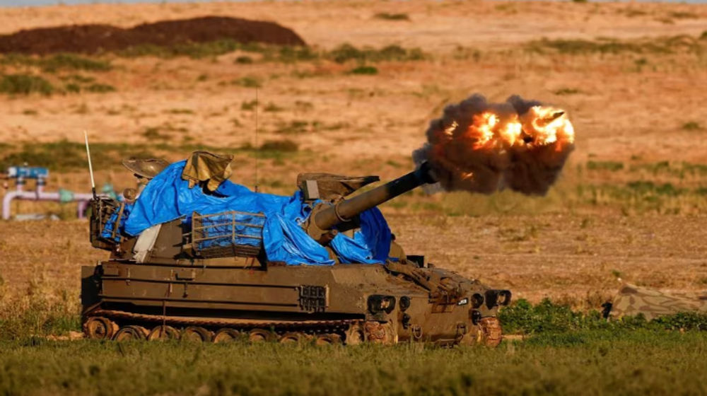 Sebuah unit artileri bergerak Israel menembak ke arah Gaza, di tengah konflik yang sedang berlangsung antara Israel dan kelompok Islam Palestina Hamas