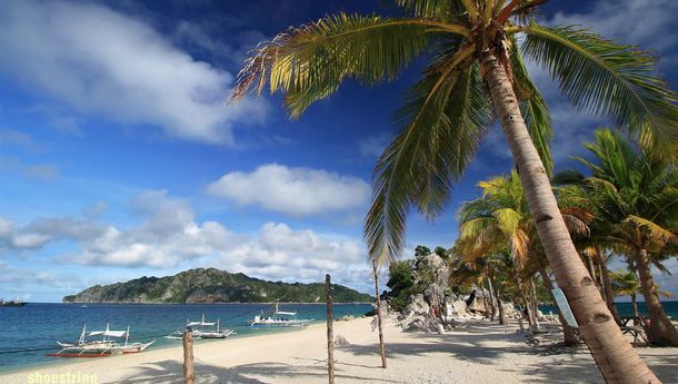 Pasir Putih dan Nyiur Melambai di Pantai Cabugao Gamay, Filipina