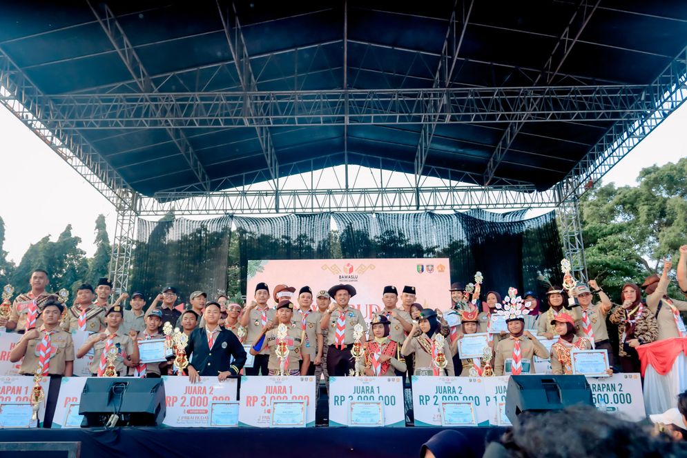 Tingkatkan Partisipasi Demokrasi, Bawaslu Lampung Gelar Pawai Budaya dan Lomba Gerak Jalan Pramuka