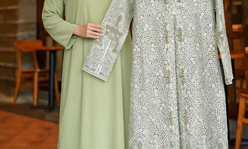 Ilustrasi gamis rompi lepas.